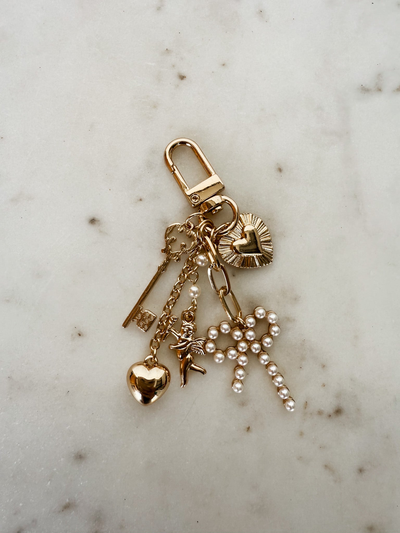 Carefree Heart Pearl Bow Bag Charm